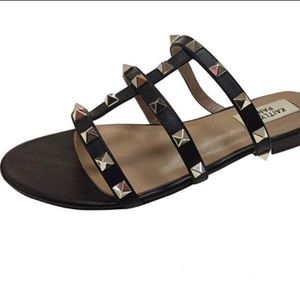 Kaitlyn Pan rock stud caged sandals.